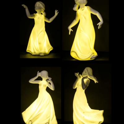 Statuina bambina in porcellana con led